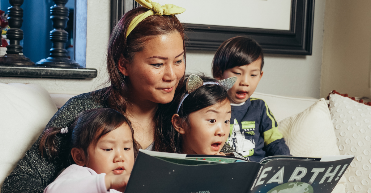 mom reading books with children